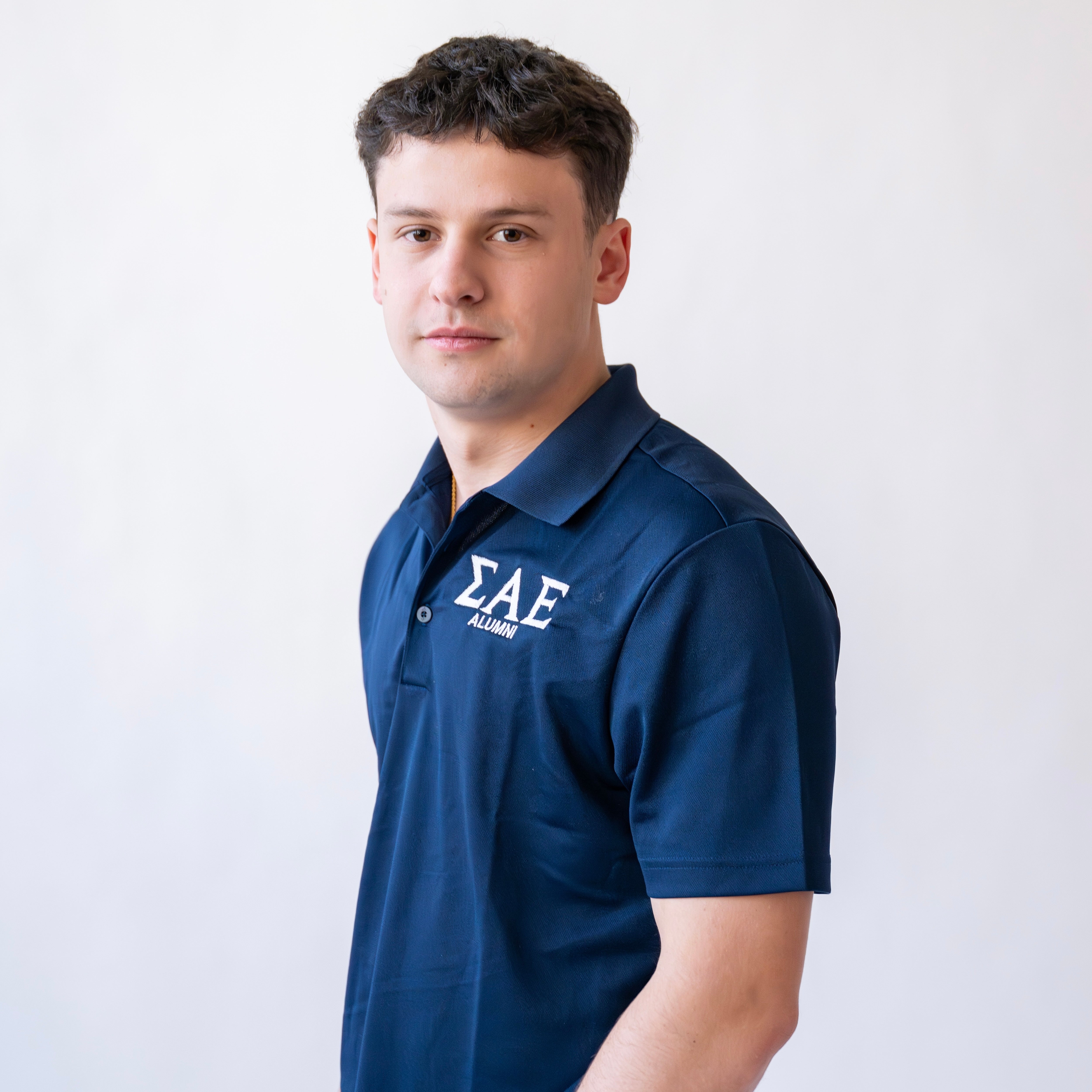 Basic Greek Letter "ALUMNI" Embroidered Polo